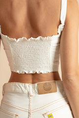 detalle top vaquero blanco mujer