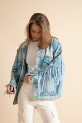 Chaqueta para para mujer customizada con flecos y pintura trasera en amarillo
