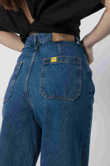 Detail of denim pants for girls